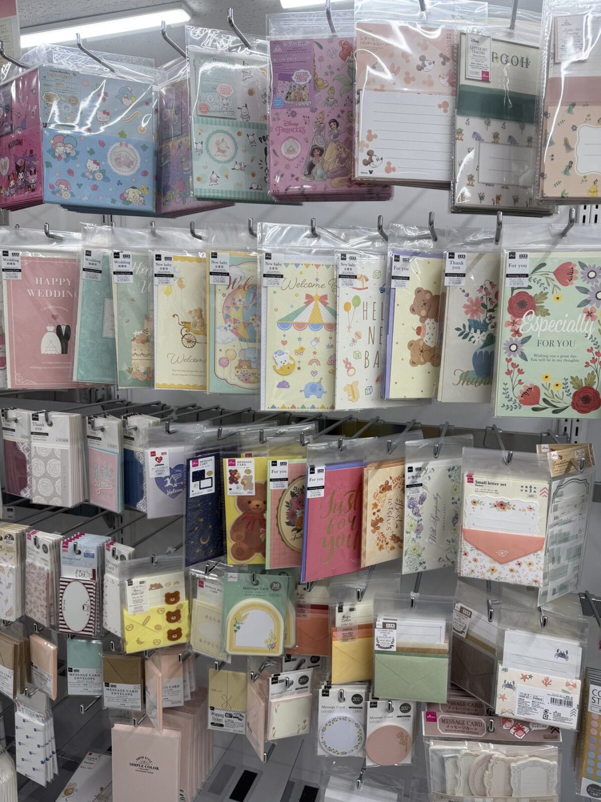 Wall of Japanese letter sets and greeting cards at DAISO