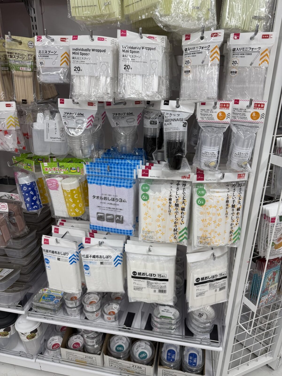 Paper oshibori hand towels and disposable tableware at DAISO