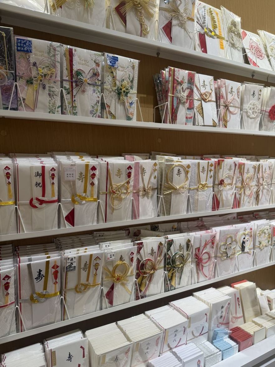 Shelf of mizuhiki decorated money envelopes at Ginza Itoya