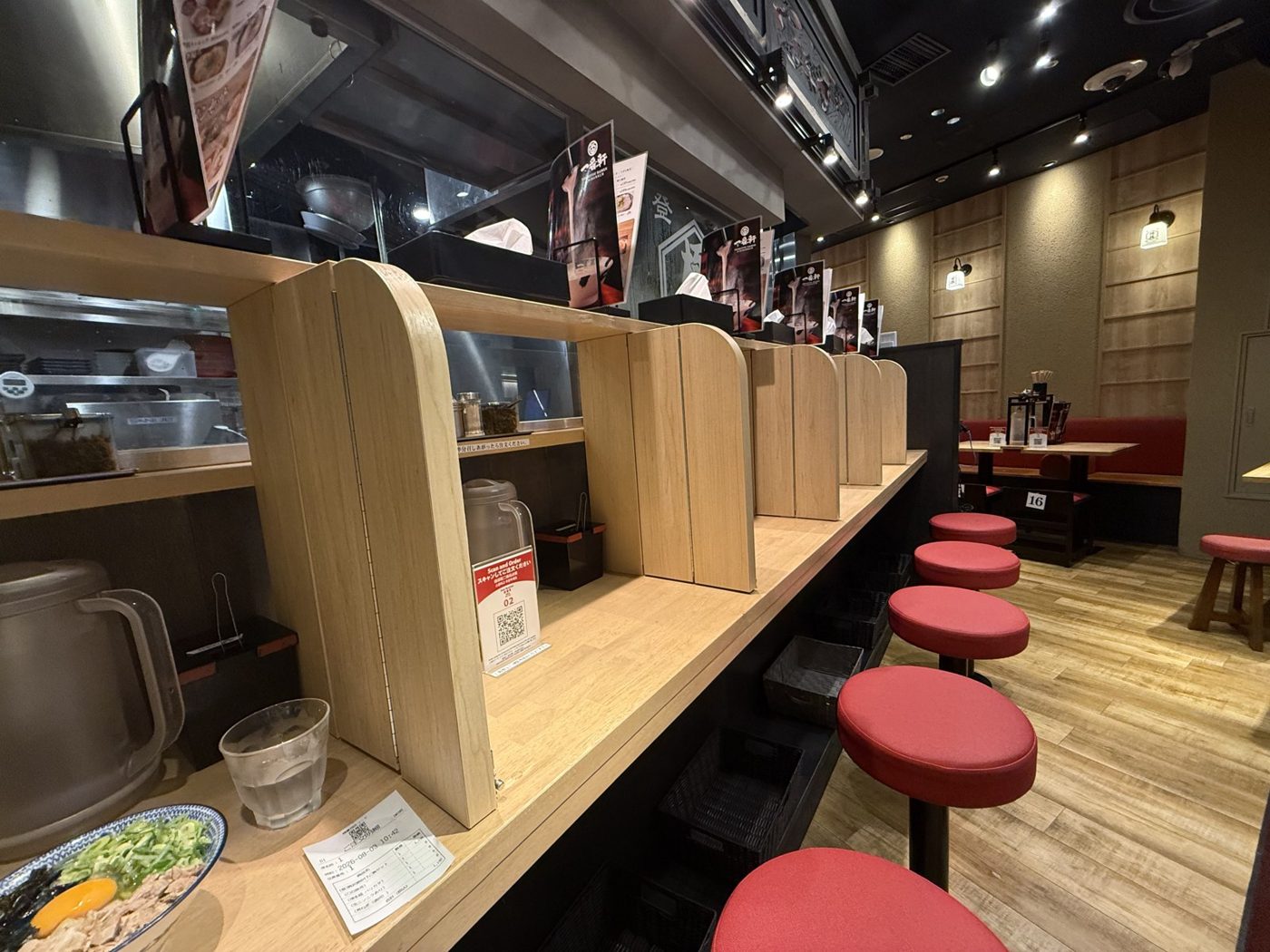 The row of divider seats. Nobody can see you. Regular tables are at the back.