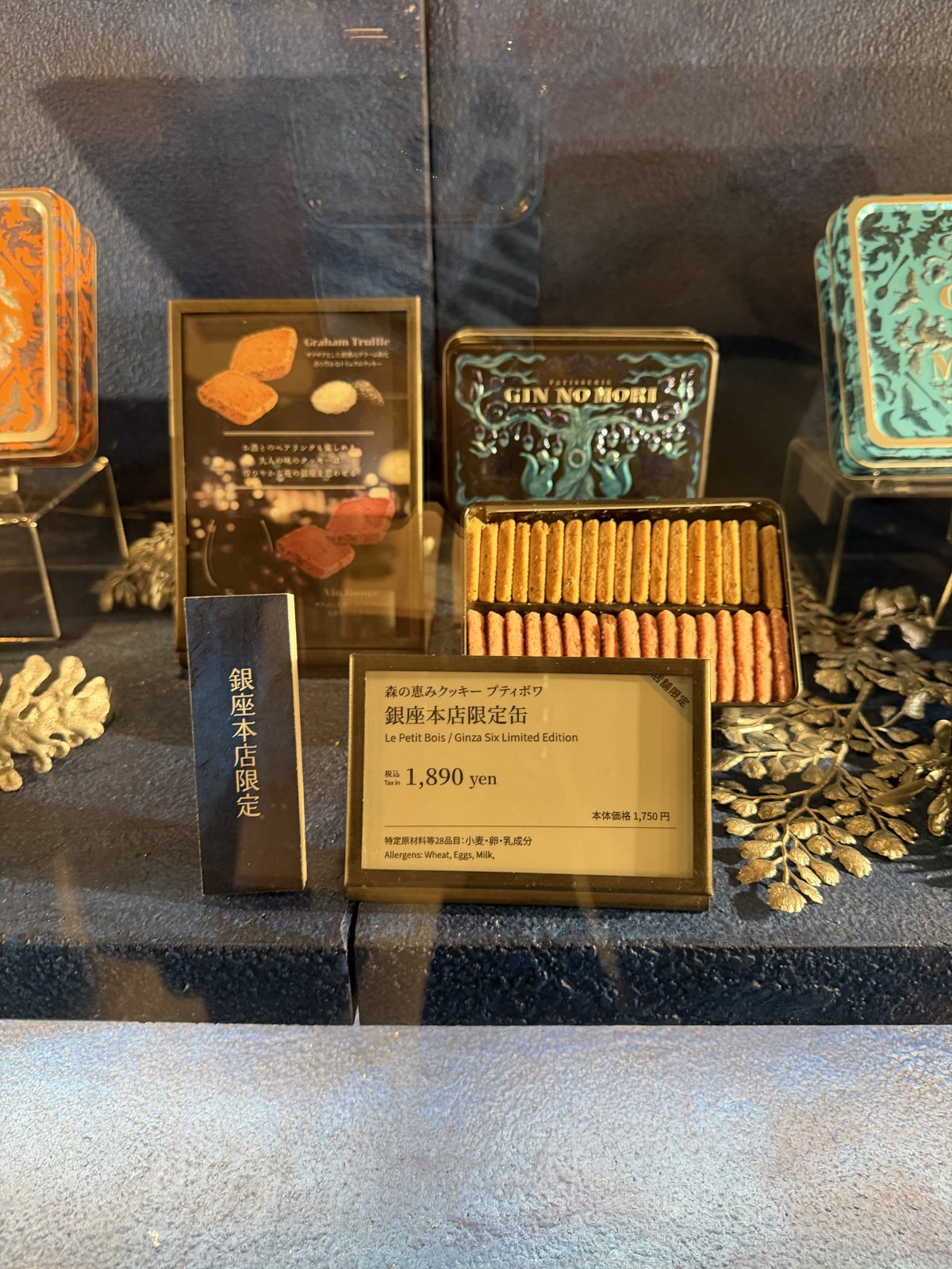 Tin of long thin cookies with a tag reading 1,890 yen, Ginza Six limited edition